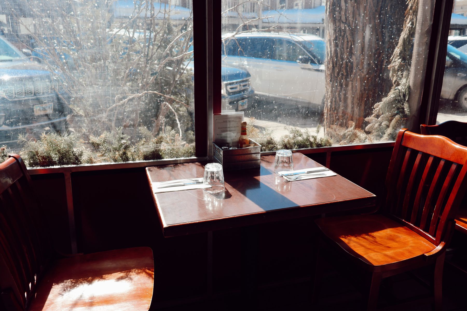 Table for two set in a warmly lit restaurant